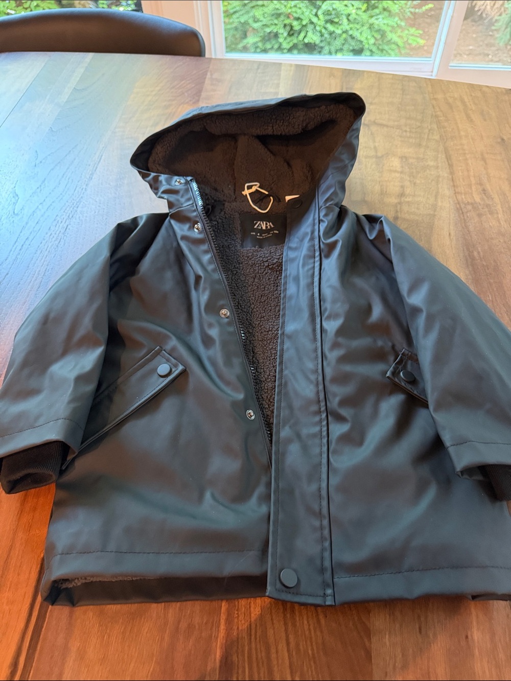 Zara Kid’s Black Hooded Raincoat